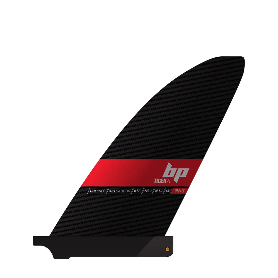 Studio image of a Black Project Tiger SUP fin with a US Box base, a SUP fin made from pre-preg carbon fiber.