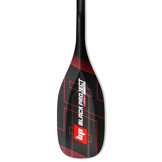Studio image of a Black Project Hydro SynergyX Paddle Blade made from carbon fiber with red and white logos and red graphics.