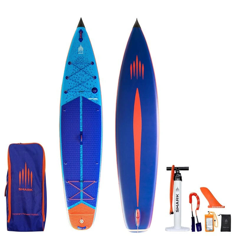 Image of Shark SUPS Venture Plus 12'6" x 32" x 6" inflatable touring paddle board with light blue deck featuring shark skin graphics and a dark blue bottom. Also showing package accessories.
