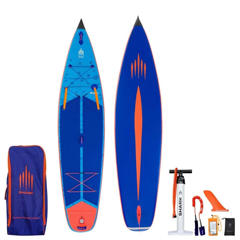 Image of Shark SUPS Cruiser Plus 11'6 x 32" x 6" inflatable paddle board with light blue deck featuring shark skin graphics and a dark blue bottom. Also showing package accessories.