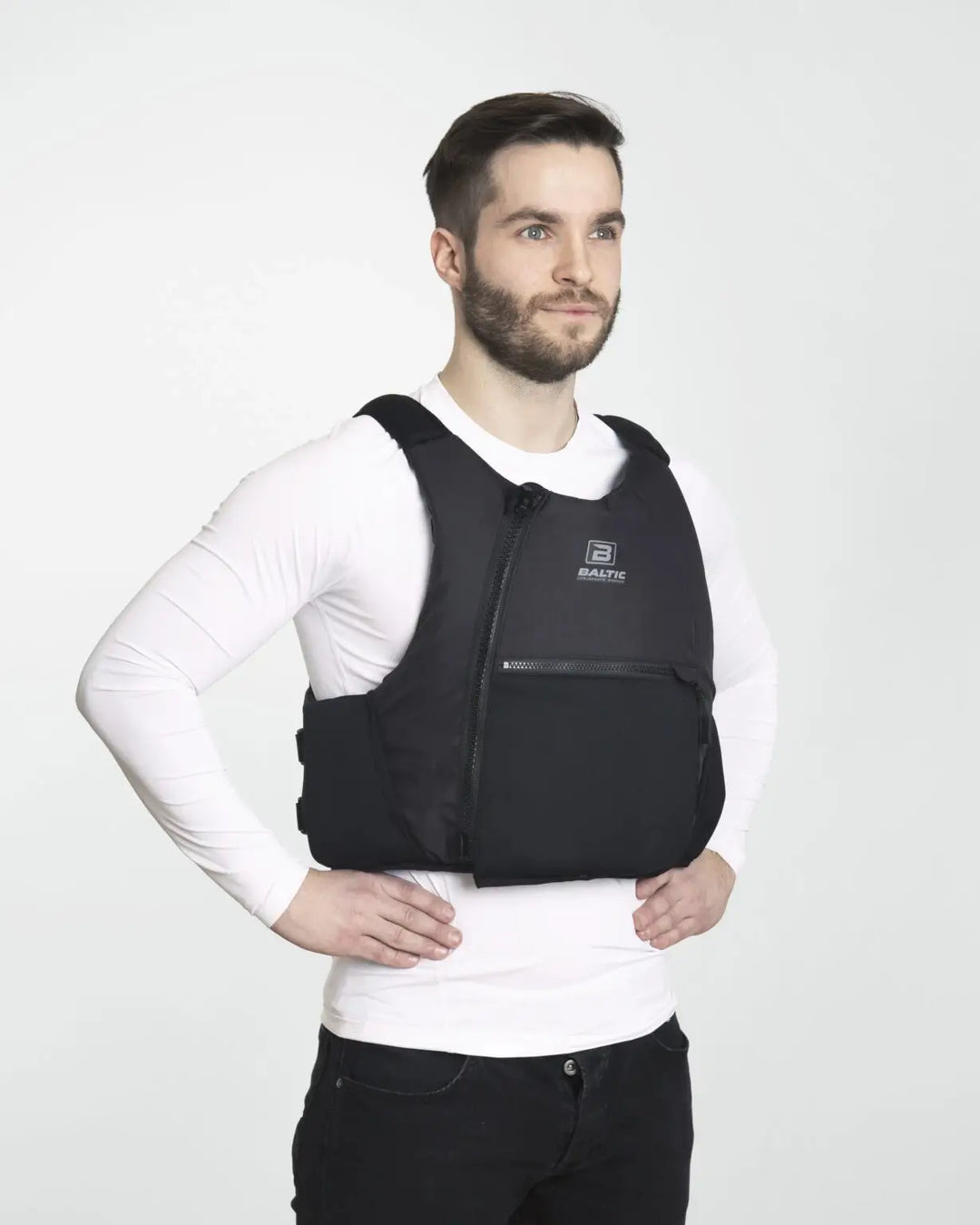 Baltic Extreme in black being worn by a male model in a studio. image from the side and front.