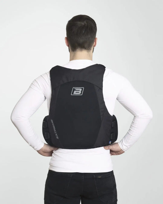 Baltic Extreme in black being worn by a male model in a studio. image from the back.