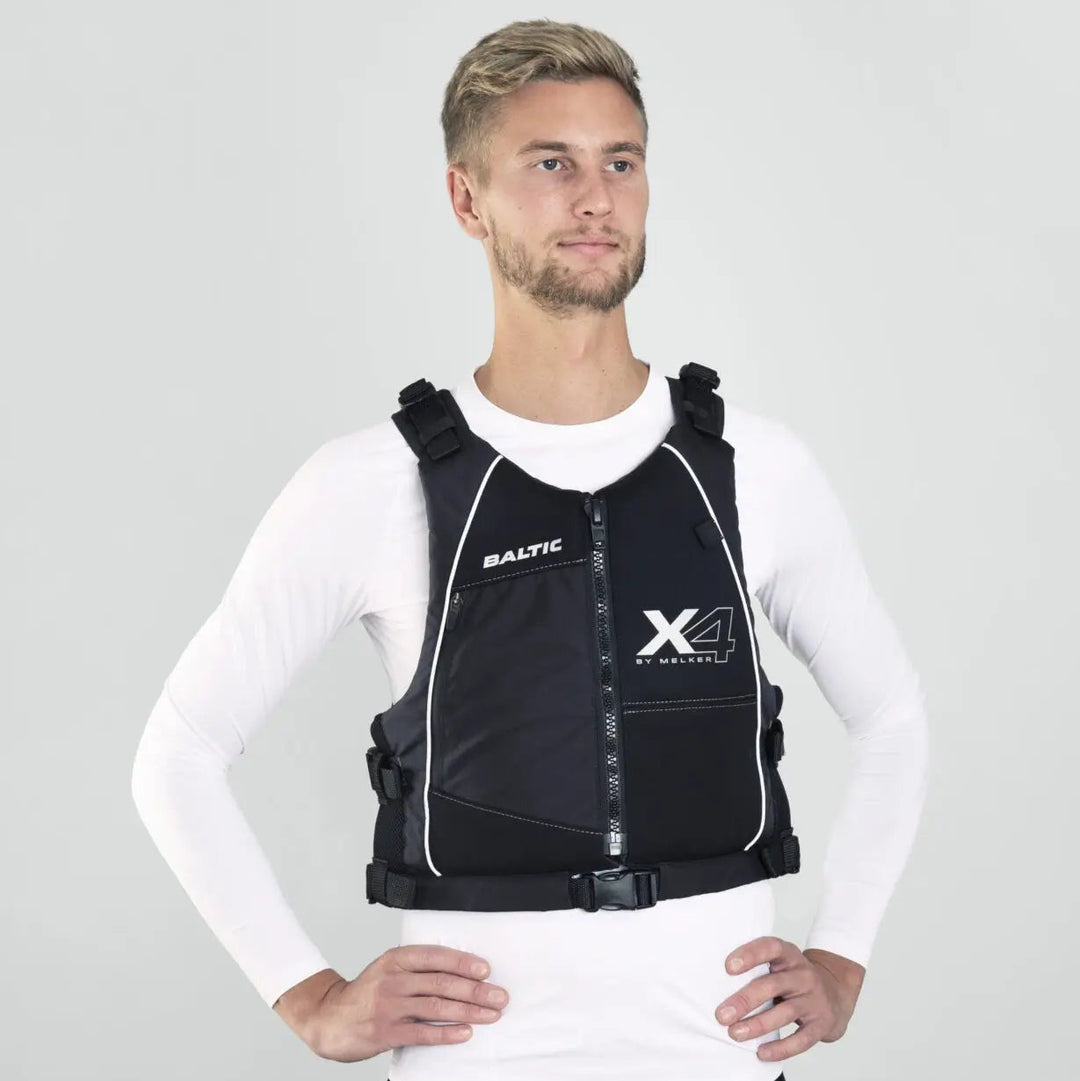 Model wearing a Baltic X4 Buoyancy Aid in black.