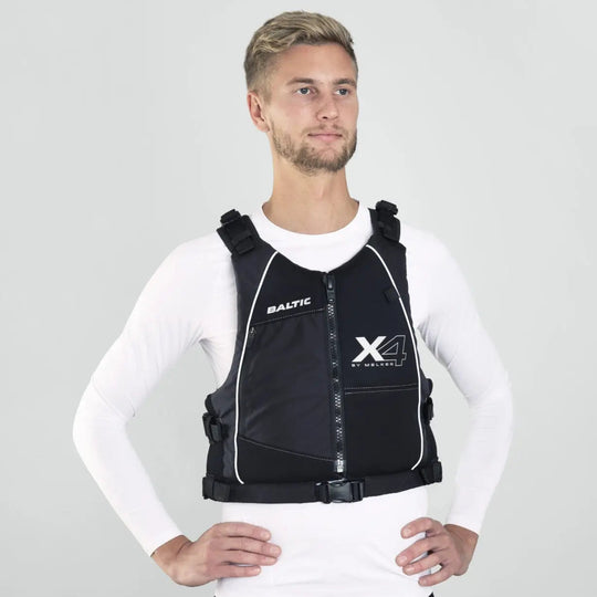 Model wearing a Baltic X4 Buoyancy Aid in black.