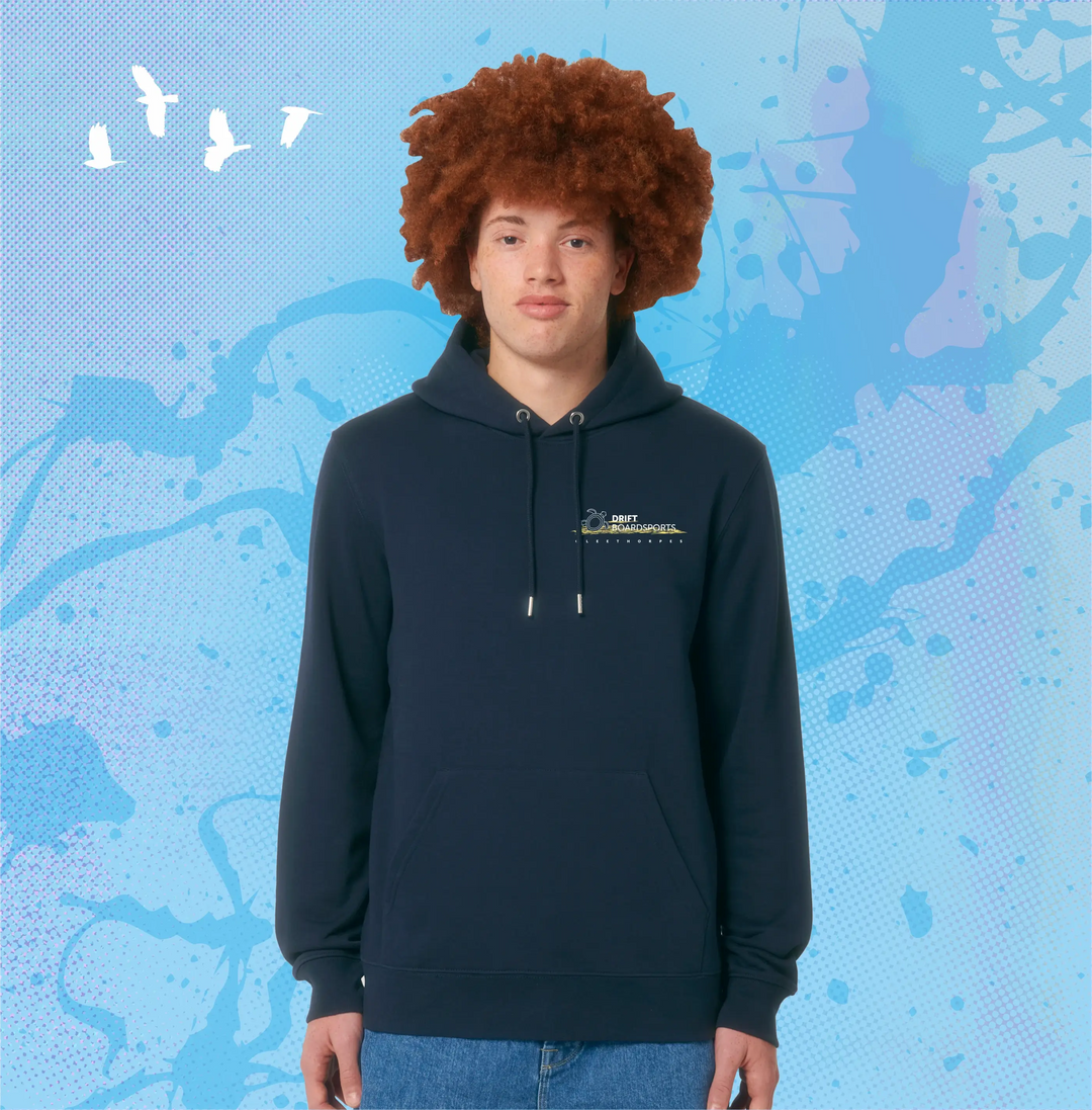 Person wearing a navy Cleethorpes hoodie with a logo on a blue patterned background.