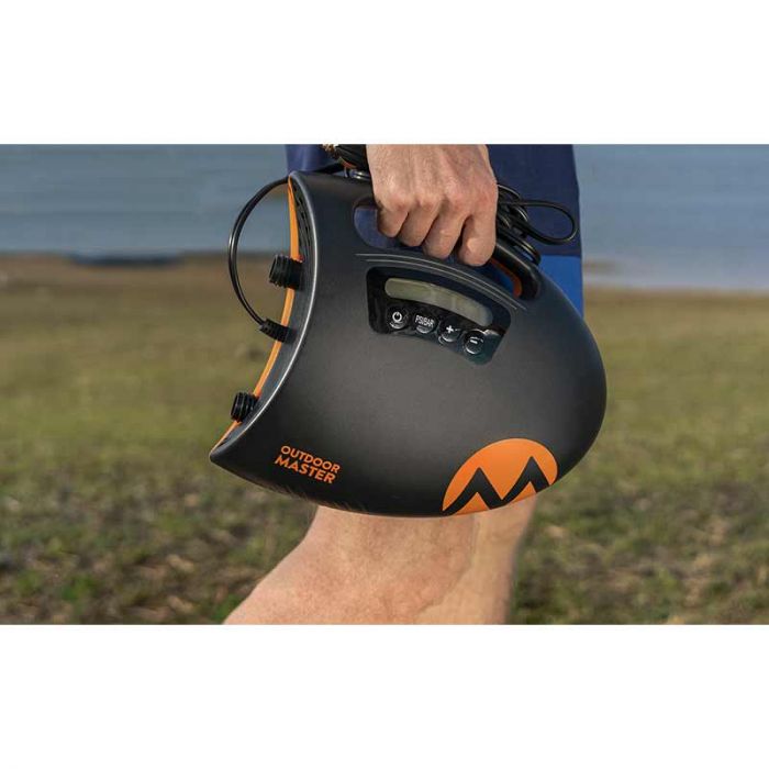 Image of the Outdoor Master Shark 2 being carried. with a grassed background.