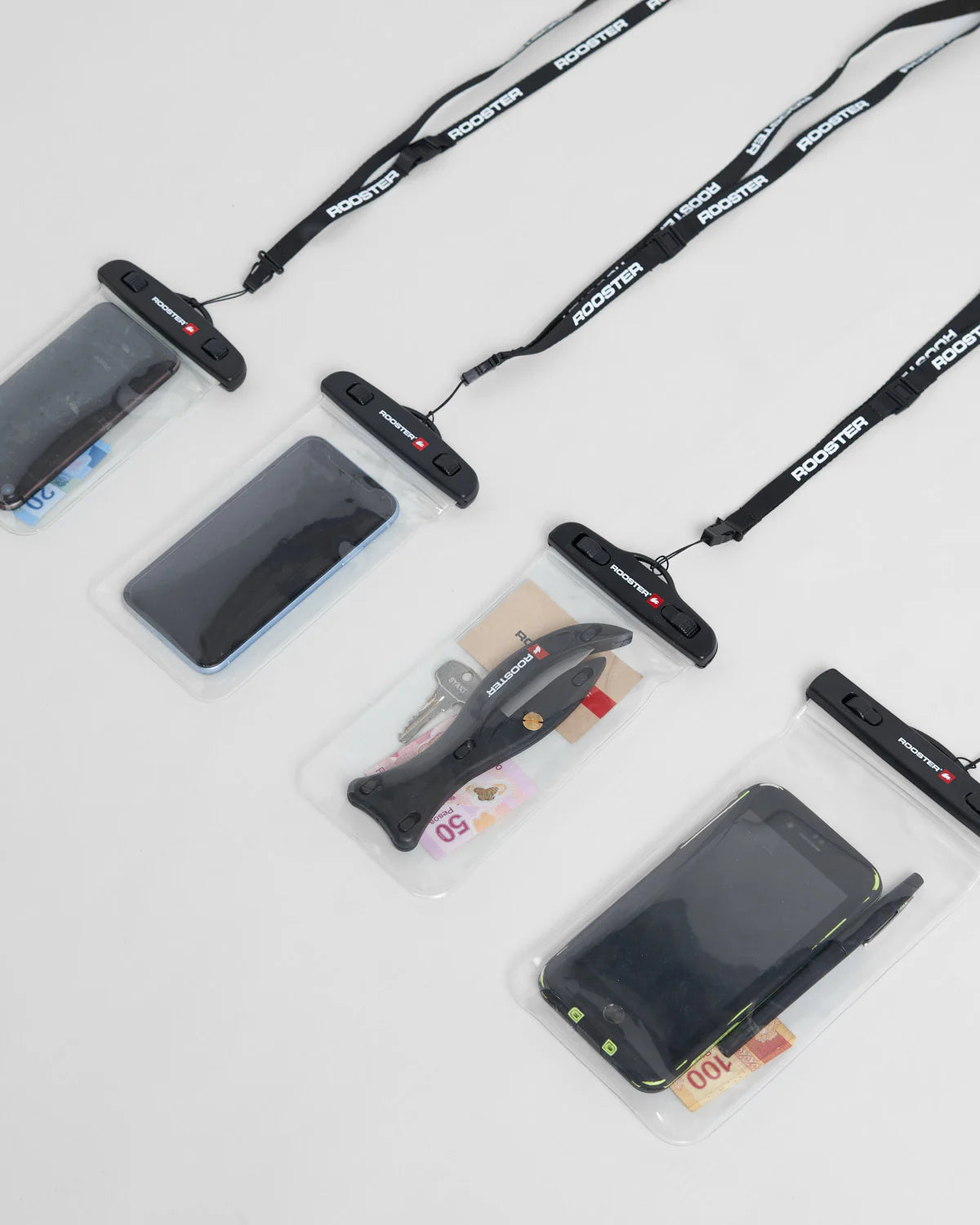 Collection of phone cases, lanyards, and accessories on a white background.