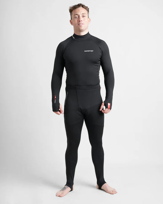 Model wearing Black hydrophobic base layer set on white studio background.