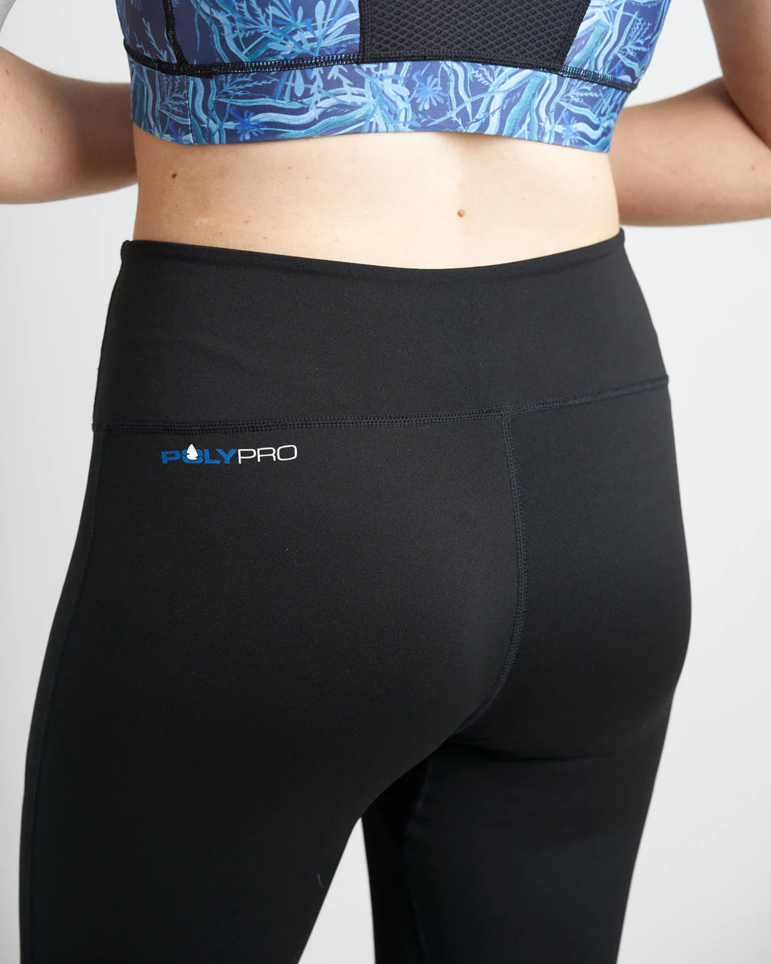 Black Rooster leggings with a visible brand logo on a plain background