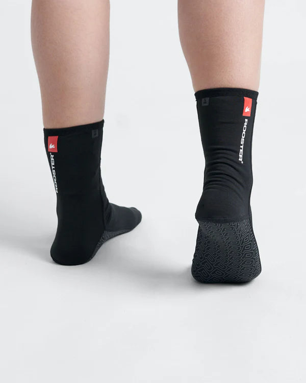Studio back image of black Rooster PolyPro Socks with white and red logo on the white background.