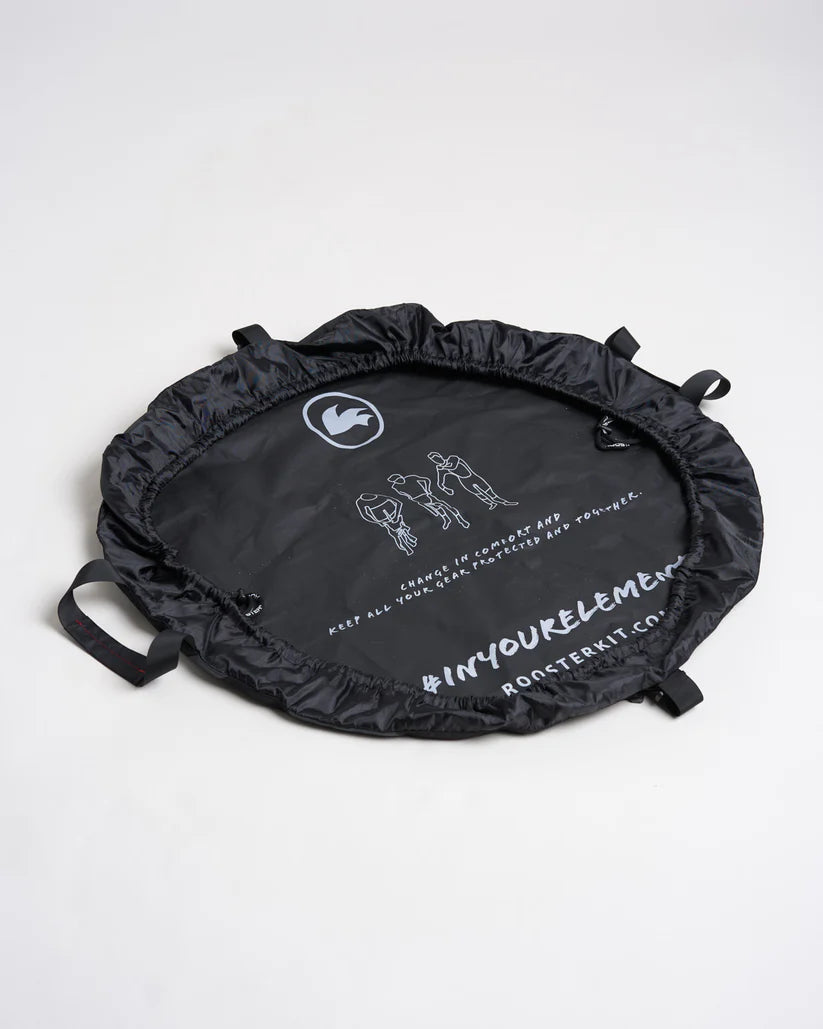 Studio image of the Rooster Changing Mat Bag showing it open on a white background.