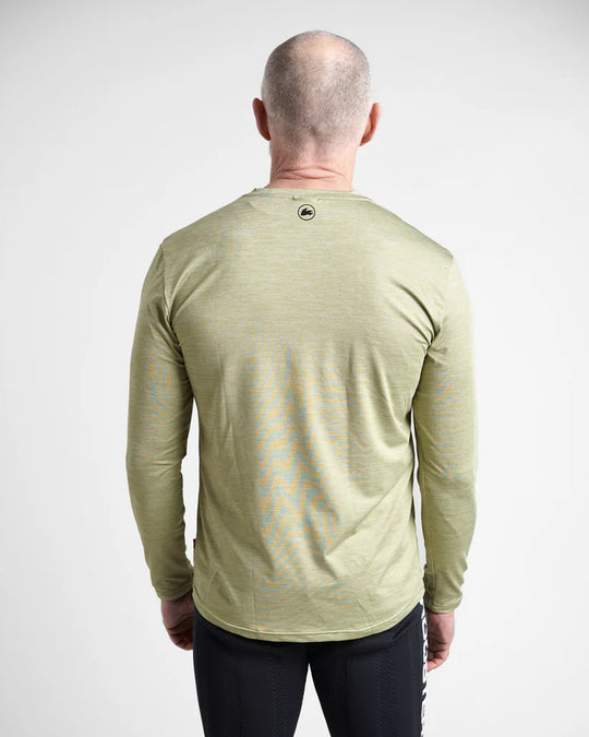 Man wearing a khaki long-sleeve quick dry t-shirt with a logo on the back against a white background.