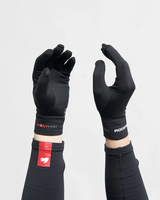 A pair of black glove liners with the Rooster brand logo on the wrist strap, designed for thermal base layer use.