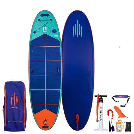 Image of Shark SUPS Yoga 10'0 x 34" x 6" inflatable yoga paddle board with light blue deck featuring shark skin graphics and a dark blue bottom. Also showing package accessories.