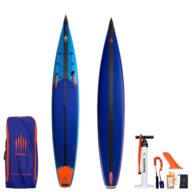 Image of Shark SUPS Speed Plus 14'0" x 26" x 5" inflatable race paddle board with light blue deck featuring shark skin graphics and a dark blue bottom. Also showing package accessories.