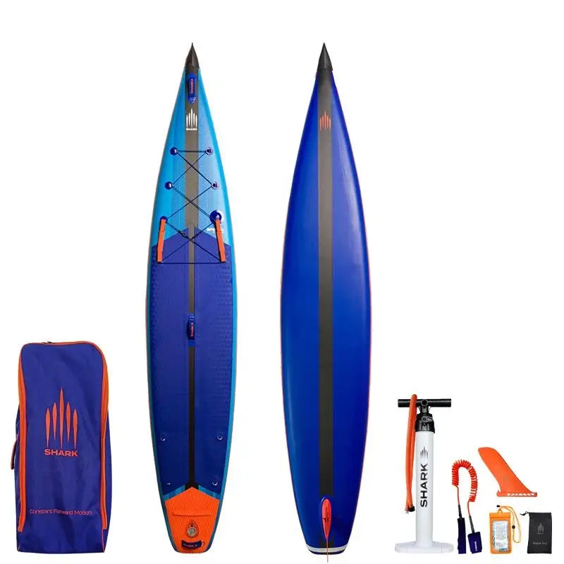 Image of Shark SUPS Speed Plus 14'0" x 28" x 6" inflatable race paddle board with light blue deck featuring shark skin graphics and a dark blue bottom. Also showing package accessories.
