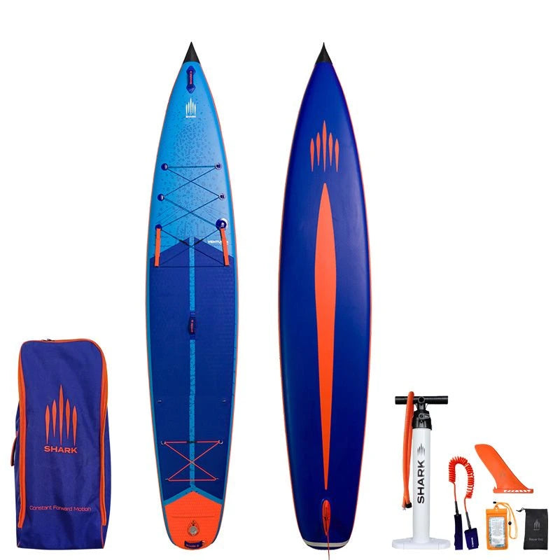 Image of Shark SUPS Venture Plus 14'0" x 32" x 6" inflatable touring paddle board with light blue deck featuring shark skin graphics and a dark blue bottom. Also showing package accessories.