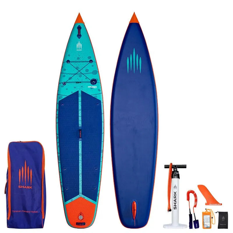 Image of Shark SUPS Cruiser Flow 11'6 x 32" x 5" inflatable paddle board with light blue deck featuring shark skin graphics and a dark blue bottom. Also showing package accessories.
