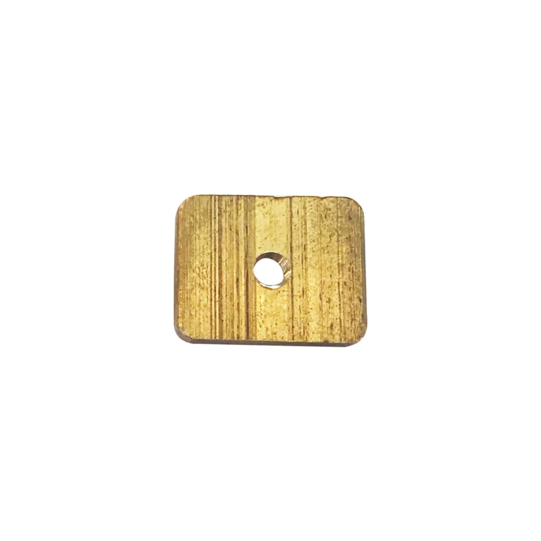 Studio image of a brass nut plate for a Starboard SUP Fin Bolt