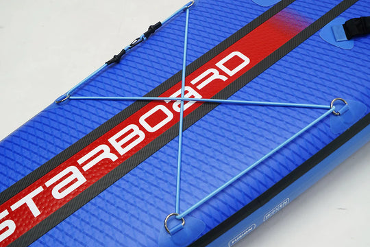 Blue and red Starboard SUP showing the blue luggage tie down bungee with a white background