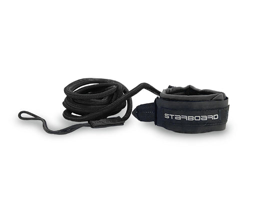 Studio image of a black Starboard SUP ankle leash.
