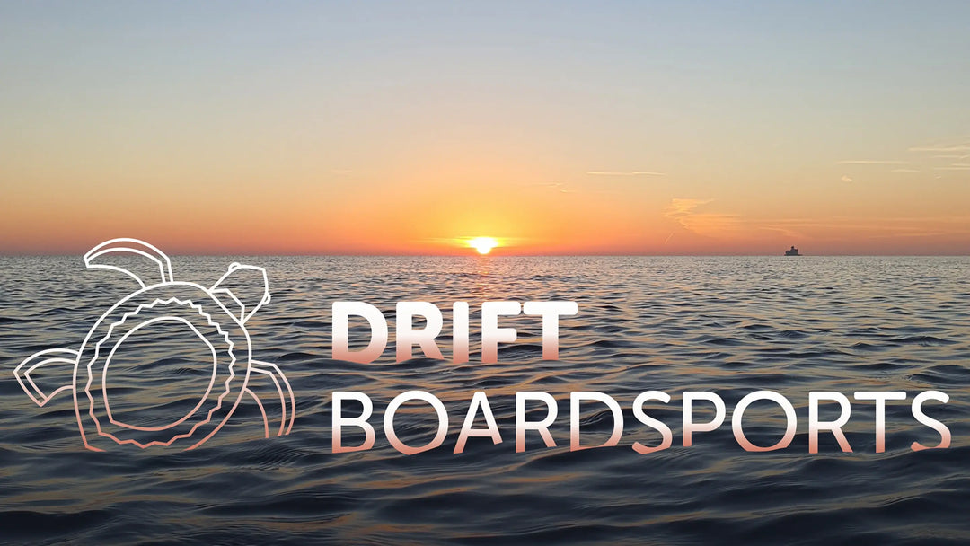 Sunrise over water at Cleethorpes with 'Drift Boardsports' logo and turtle icon.