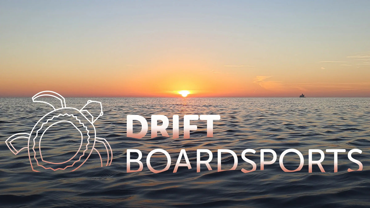 Sunrise over water at Cleethorpes with 'Drift Boardsports' logo and turtle icon.